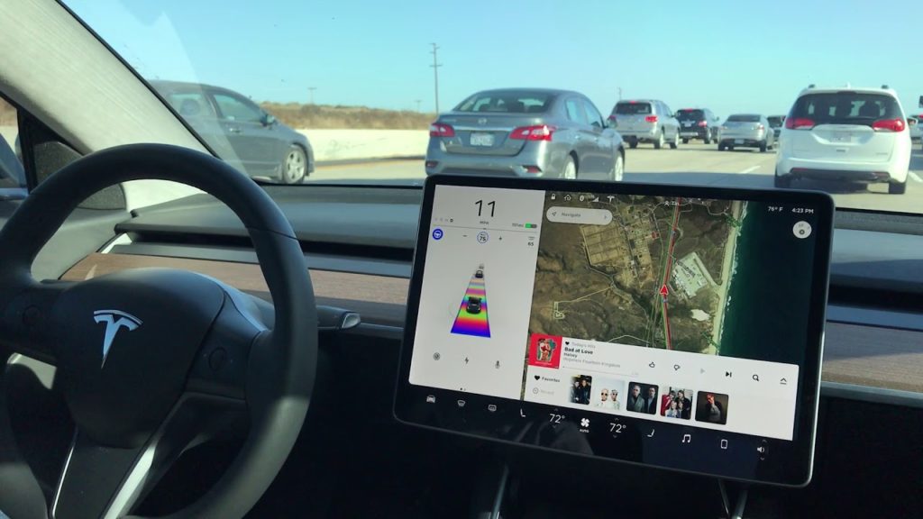 Vidéo:Autopilot du Model 3 : stop and go et changement de file